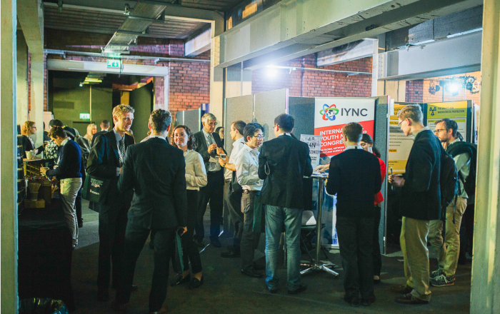 Exhibit hall and the IYNC booth (Source:ENYGF)